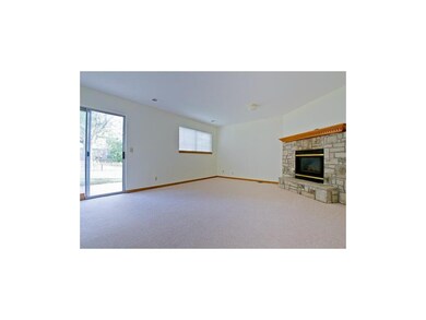 Family room walks out to back patio.  New carpet!