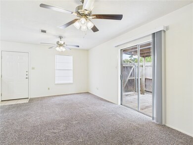Unfurnished room with light colored carpet