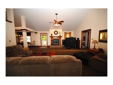 Great Room. Great room with wood burning fireplace.