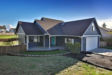 To the left of this picture, inside the fenced yard, is a shed. Easy access to the shed from the front of home through an access gate!