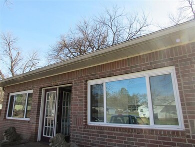 Property entrance with brick siding