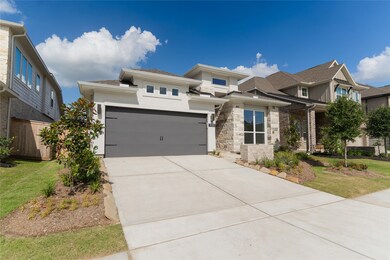 This is a modern two-story home with a sleek desig