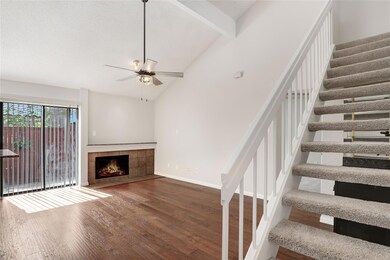 Cozy wood burning fireplace and rich engineered wo