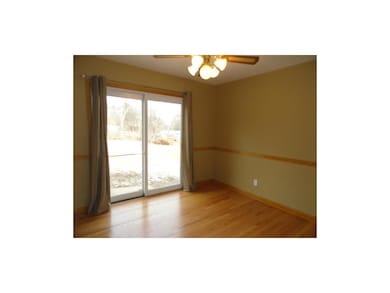 Formal dining room with sliding door to back yard.