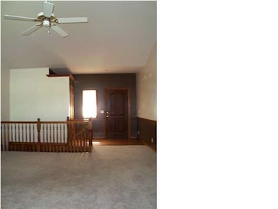 Entry offers coat closet, wood floor, and room to 