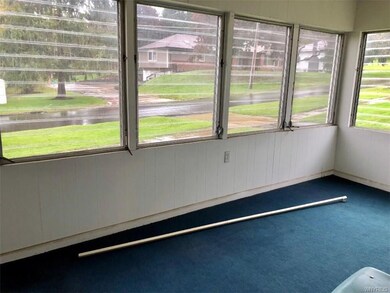 Enclosed front porch