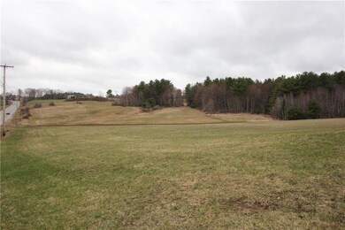 Pastures, rolling hill and wooded land