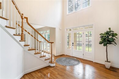 Gleaming hardwood floors throughout.