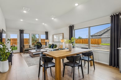 Dining Room in the Turquoise home plan by Trophy Signature Homes – REPRESENTATIVE PHOTO