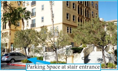 View of designated parking at base of stairs near the unit.