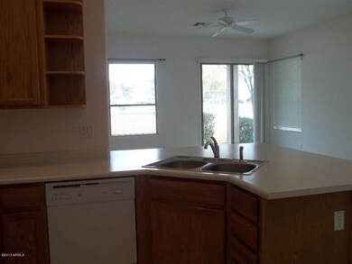 KITCHEN OPENS TO GREAT ROOM