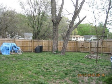 Huge backyard, wood privacy fence, trees for shade