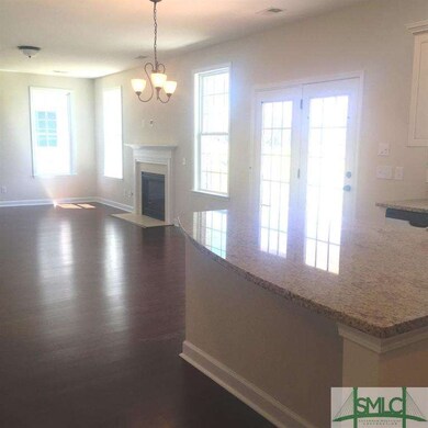 Spacious family room with gas firelace