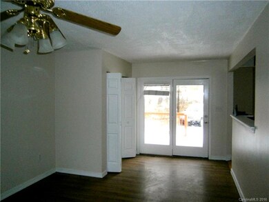 Entry Door To Living Room, Laundry Closet On Left