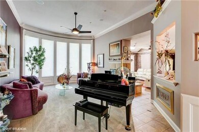 Fabulous formal living room with curved window are