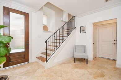 Lovely travertine floored entry with loads of natu