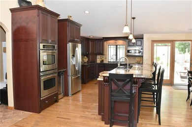 Impressive is what this kitchen is.  Custom cherry