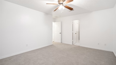 Expansive primary bedroom offering comfort and sty