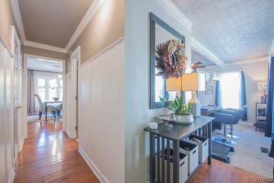 Beautifully designed foyer with crown molding and