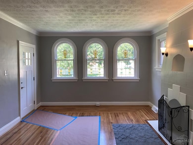 Living Room - stained glass , refinished hardwood floor.