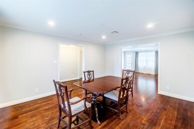 Generous sized Dining Room with elegant finishes.