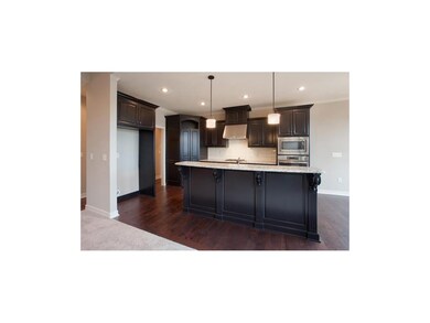 Kitchen includes: Granite counter tops, Delta oil 