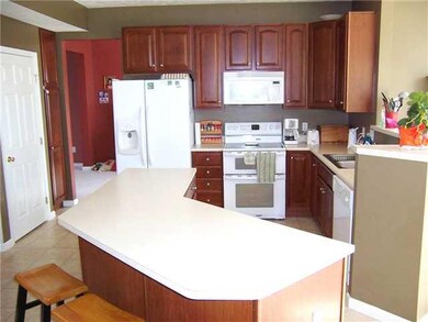 Kitchen. Spacious center island and matching appli