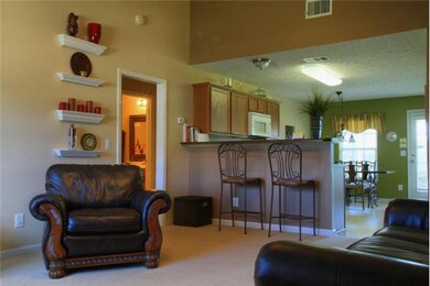 This great bar separates the kitchen and living room.  It also will seat a few people if you so choose!