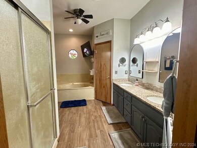 primary bath with whirlpool tub, seperate closet,