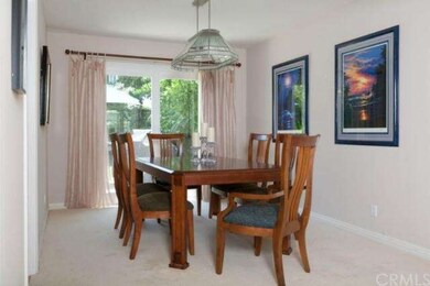 Formal dining room is located in between living ro