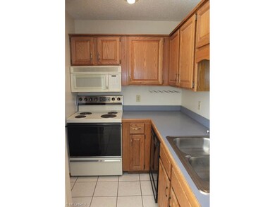 Kitchen comes fully applianced.