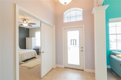 entryway to home and 4th bedroom with double doors