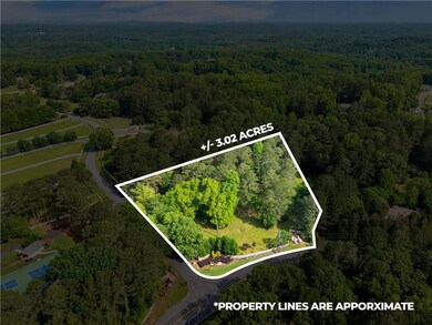 Aerial overview of property's location with a forest and property boundaries highlighted
