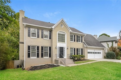 Colonial inspired home with cooling unit, a front 