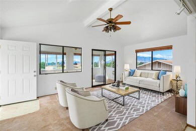 Main home, upstairs living room. *Virtually staged