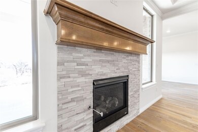 Interior details featuring crown molding and wood-