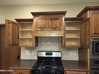 305 E Maple St, Liberal, MO 64762 - photo 7