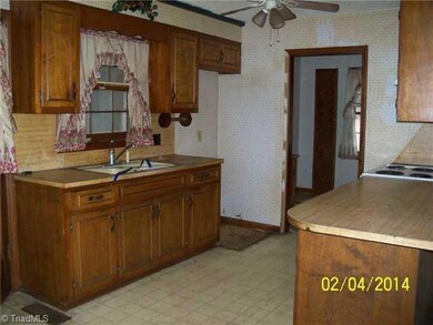 Kitchen. Kitchen open to Breakfast Area.  Laundry Room with Sink off Kitchen