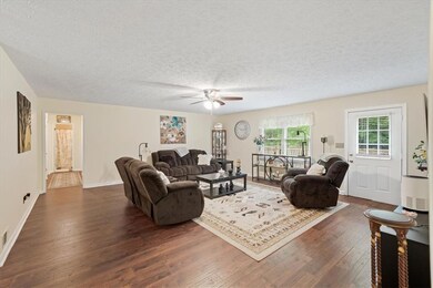 Large living area with access to the deck