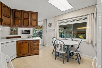 Breakfast area with view to enclosed patio.