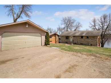 Two car detached garage and room for 3-4 cars in t