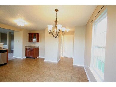 Kitchen. There is plenty of space for dining while enjoying spectacular views of the pond