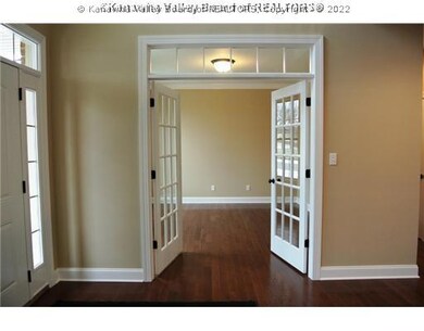 Exterior Front. Formal Living Room, French doors