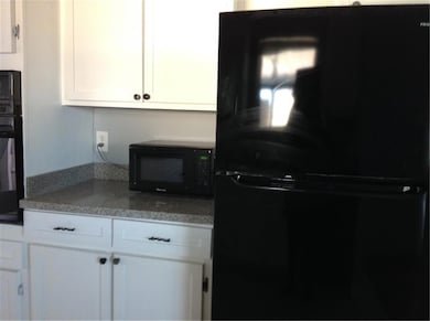 more cabinets and new refrigerator