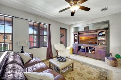 Living room featuring light tile patterned floorin