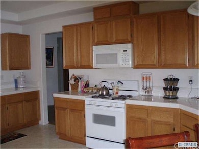 Oak Cabinets, Ceramic Counters