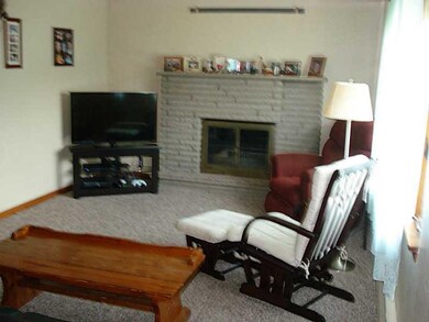 Exterior Front. Large Living Room w/fireplace.