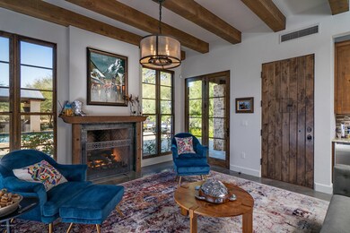 Living Room and Entrance to Wine Cellar