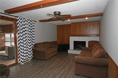 Family room with patio door to covered deck