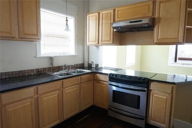 UNIT A - kitchen w/ pass through to dining room